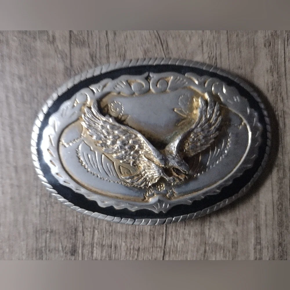 Silver/gold tone oval Eagle Belt Buckle. Made in USA